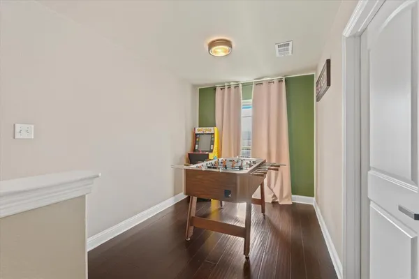 a bathroom with a double vanity sink mirror and shower