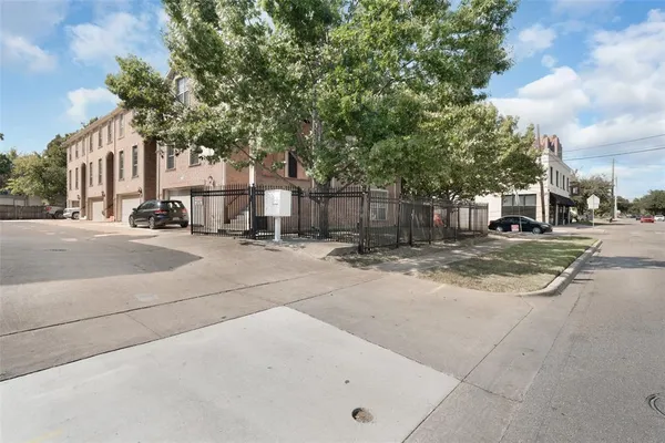 a sign board with yard in front of it