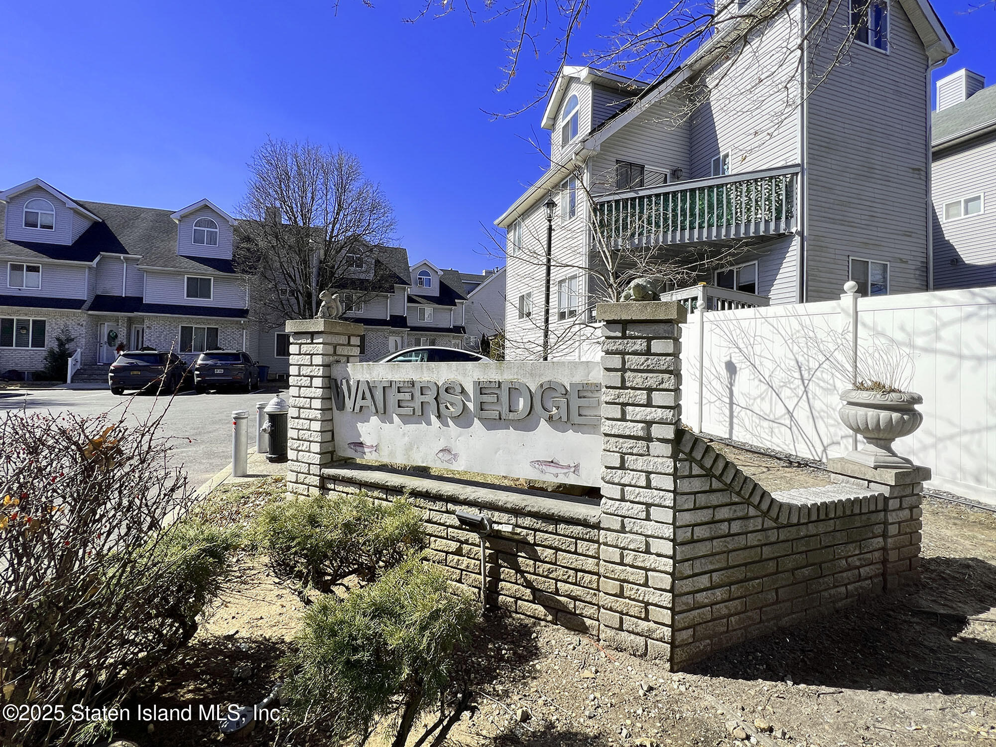 45 Fairlawn Loop Staten Island, NY 10308 - Photo 41 of 49 a view of roof deck with a bench and wooden floor