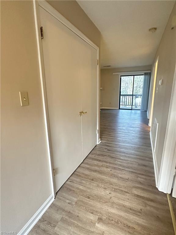 222 Ridge Forest Court Winston-Salem, NC 27104 - Photo 21 of 29 Looking from front door to back deck