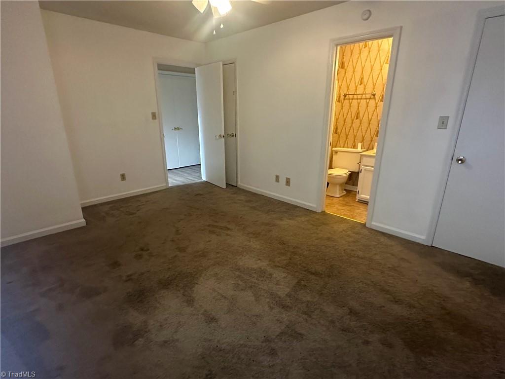 222 Ridge Forest Court Winston-Salem, NC 27104 - Photo 22 of 29 Primary bedroom with ensuite bath
