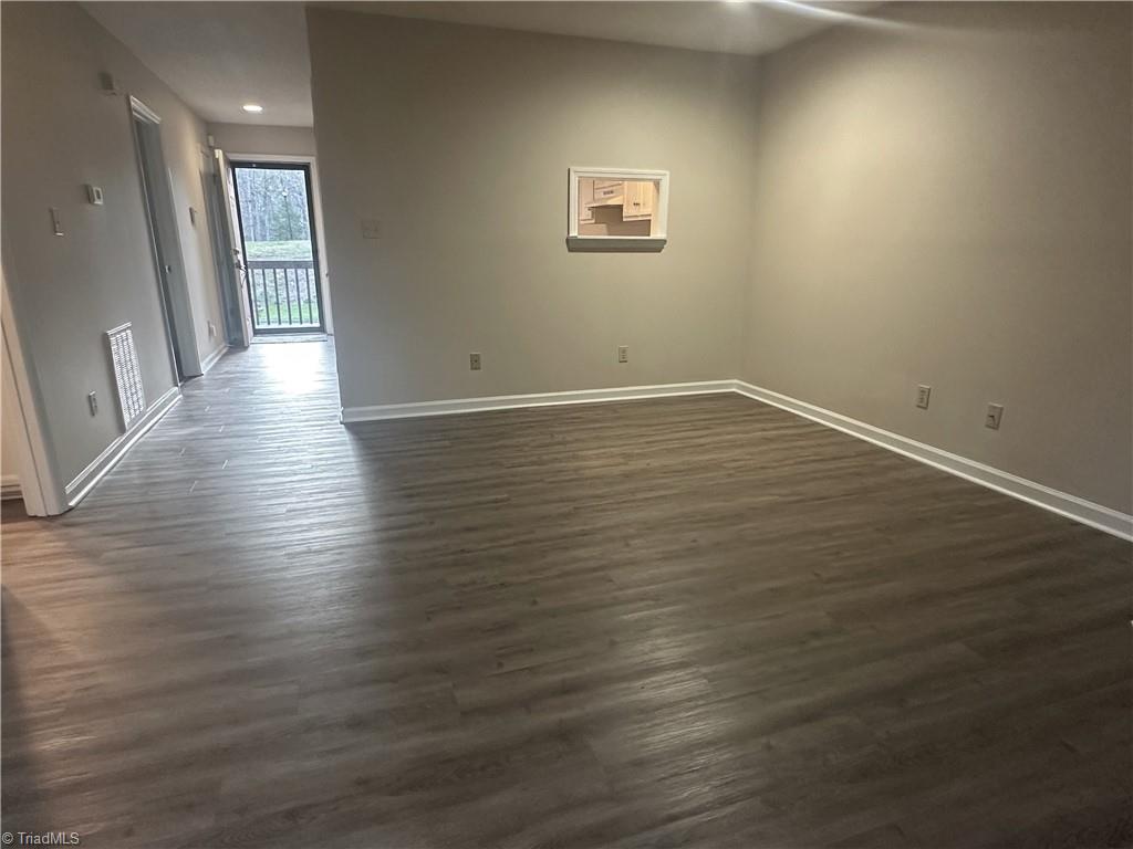 222 Ridge Forest Court Winston-Salem, NC 27104 - Photo 27 of 29 Looking from living room to front door