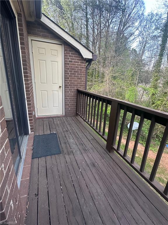 222 Ridge Forest Court Winston-Salem, NC 27104 - Photo 29 of 29 Back deck with storage room