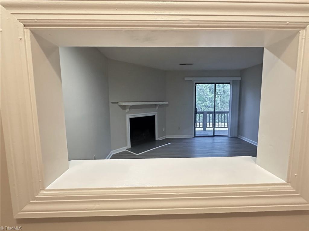 222 Ridge Forest Court Winston-Salem, NC 27104 - Photo 8 of 29 Pass through from kitchen to living room