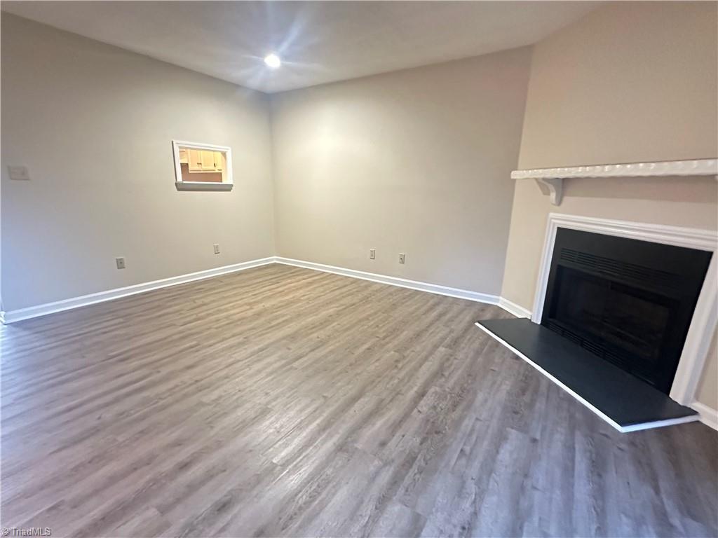 222 Ridge Forest Court Winston-Salem, NC 27104 - Photo 10 of 29 Living room also with dining area
