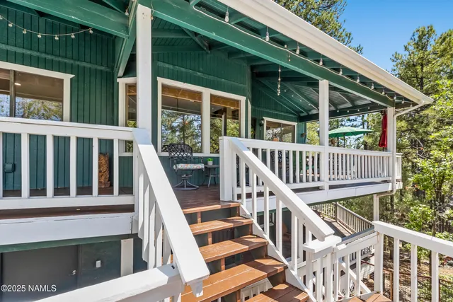 a view of a house with deck and deck