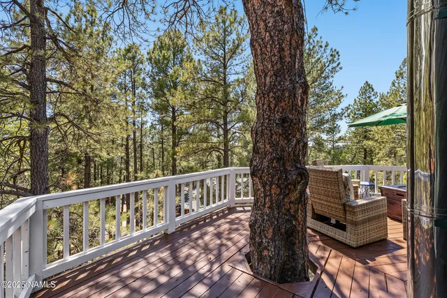 a view of balcony with furniture