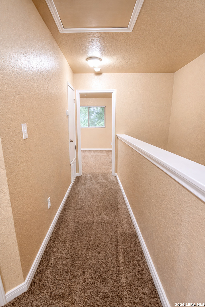 8711 8th Street, Unit 1 Converse, TX 78109 - Photo 11 of 25 a view of hallway with stairs