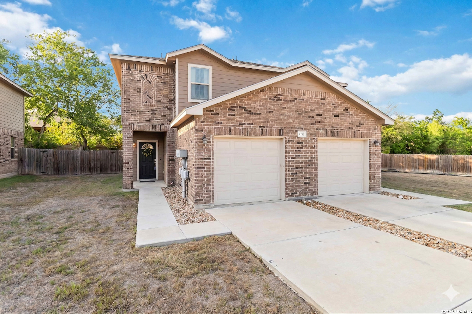 8711 8th Street, Unit 1 Converse, TX 78109 - Photo 22 of 25 a view of a house with a yard
