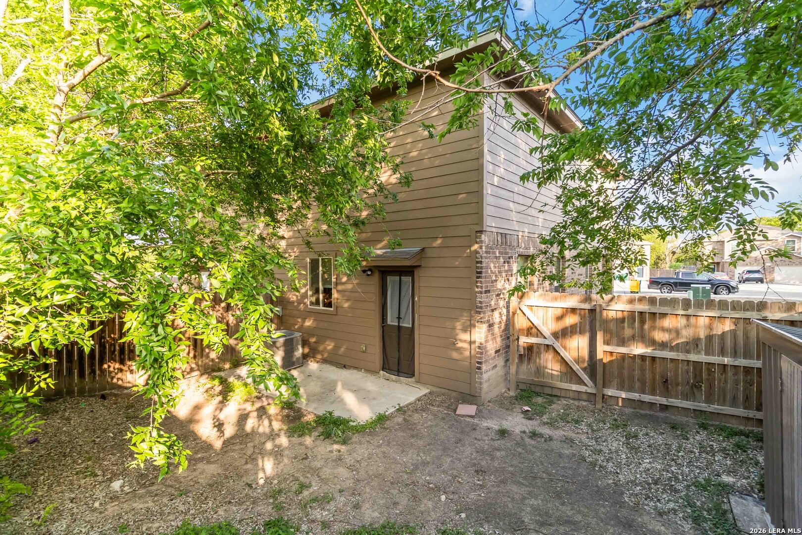 8711 8th Street, Unit 1 Converse, TX 78109 - Photo 25 of 25 a house with a tree in front of it