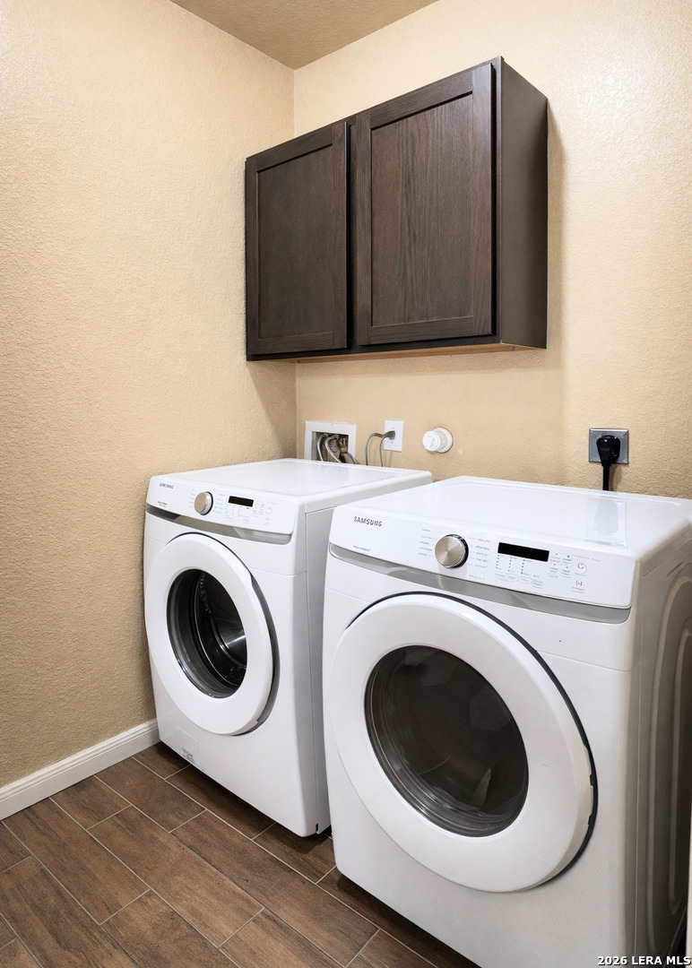 8711 8th Street, Unit 1 Converse, TX 78109 - Photo 8 of 25 a utility room with dryer and washer