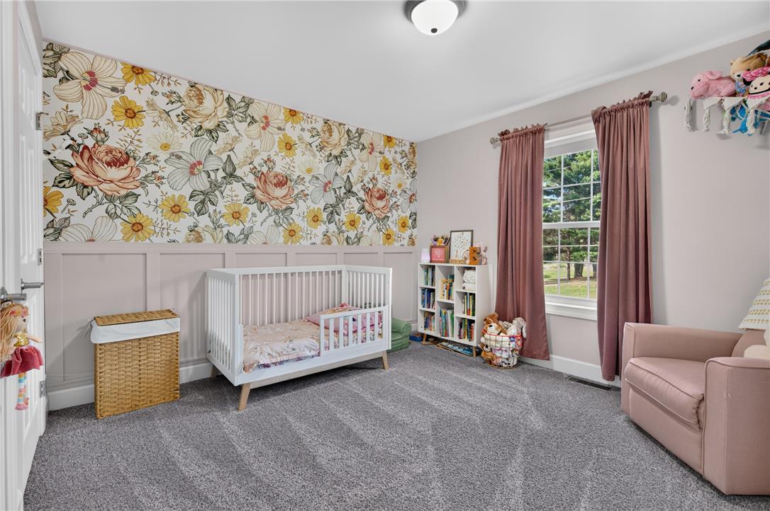 74 Kepners Road New Ringgold, PA 17960 - Photo 33 of 79 Plush carpeting and wainscoting detail this bright secondary bedroom.