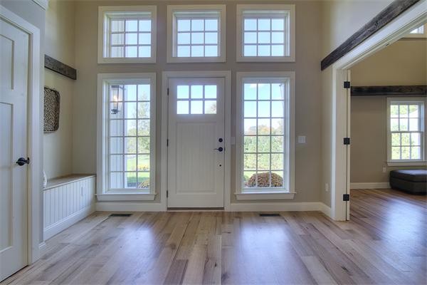 410 High Plain Road Andover, MA 01810 - Photo 11 of 30 an empty room with wooden floor and windows