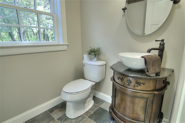 410 High Plain Road Andover, MA 01810 - Photo 24 of 30 a bathroom with a toilet and a mirror
