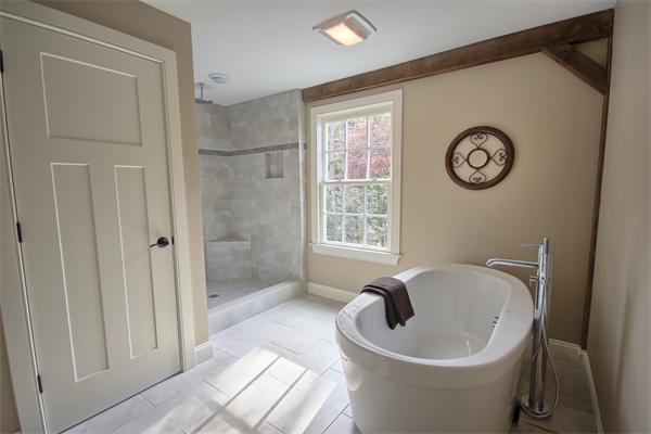 410 High Plain Road Andover, MA 01810 - Photo 26 of 30 a view of a bathtub in a bathroom