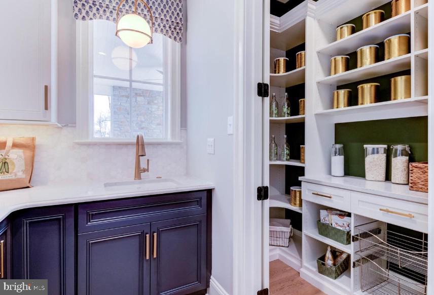 718 South Waterloo Road Devon, PA 19333 - Photo 23 of 25 a kitchen with a cabinets and window