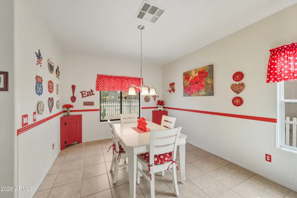 a view of a dining room with furniture