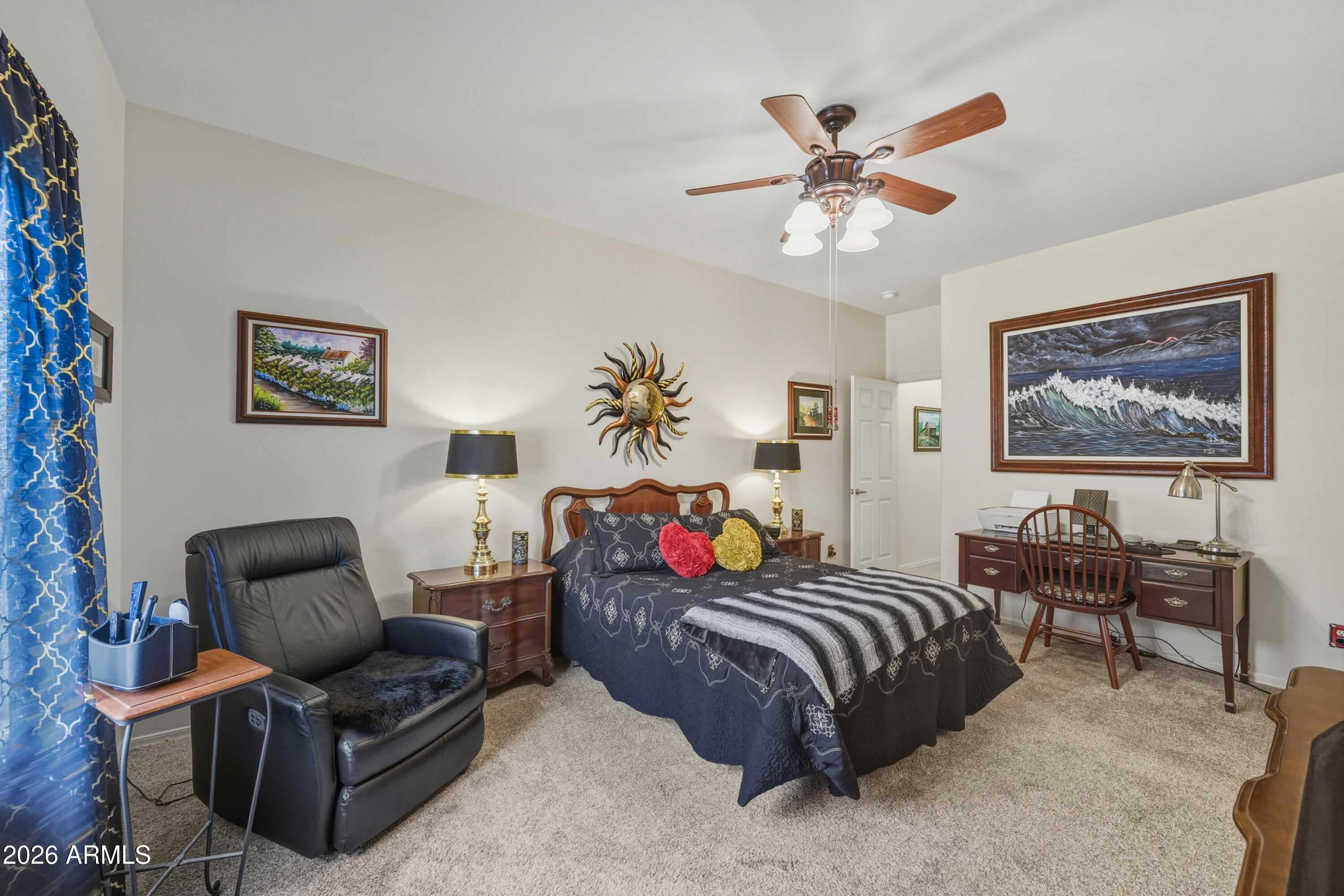 2101 South Meridian Road, Unit 198 Apache Junction, AZ 85120 - Photo 14 of 29 a bedroom with furniture and a ceiling fan