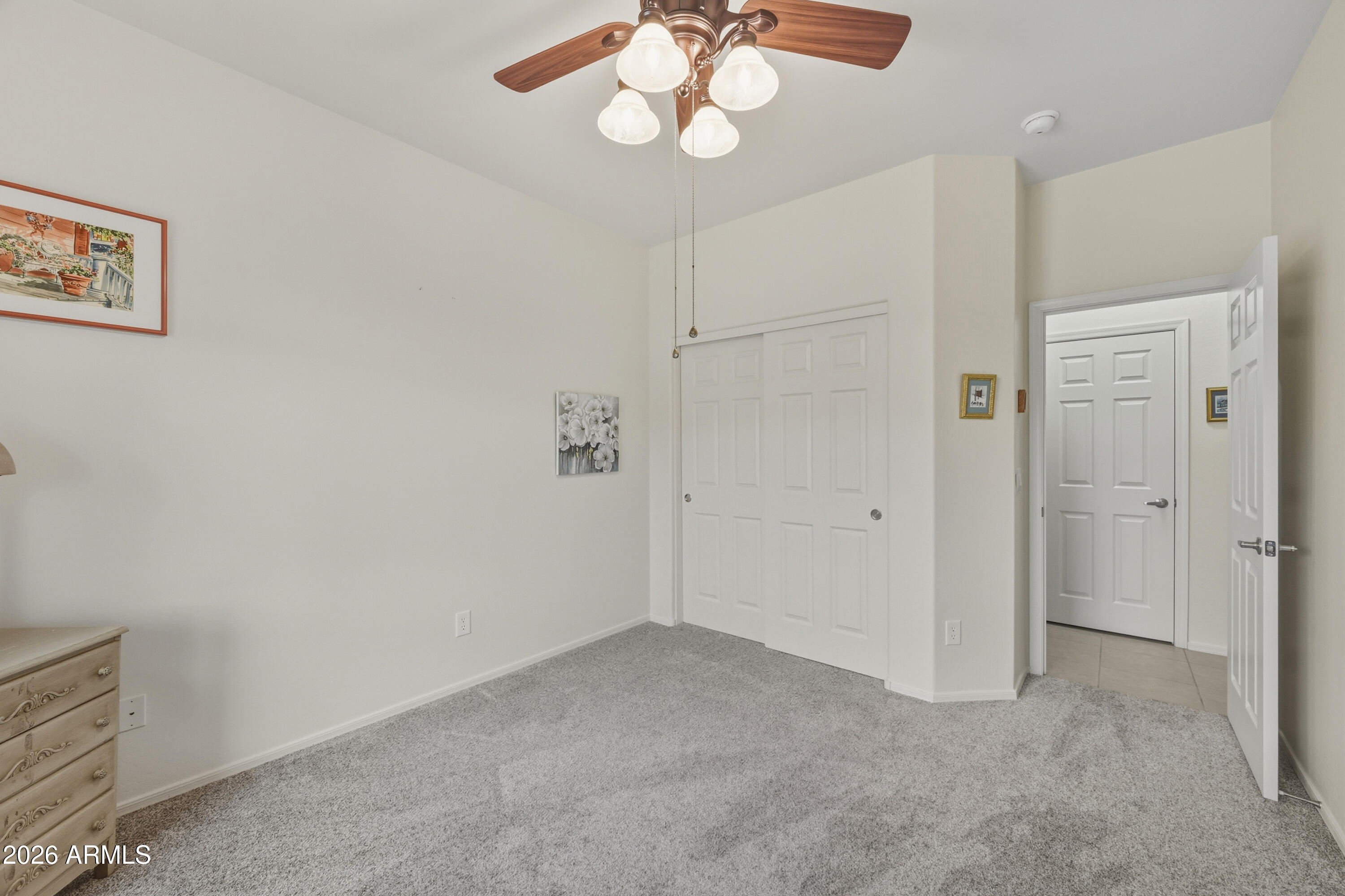 2101 South Meridian Road, Unit 198 Apache Junction, AZ 85120 - Photo 21 of 29 wooden floor in an empty room