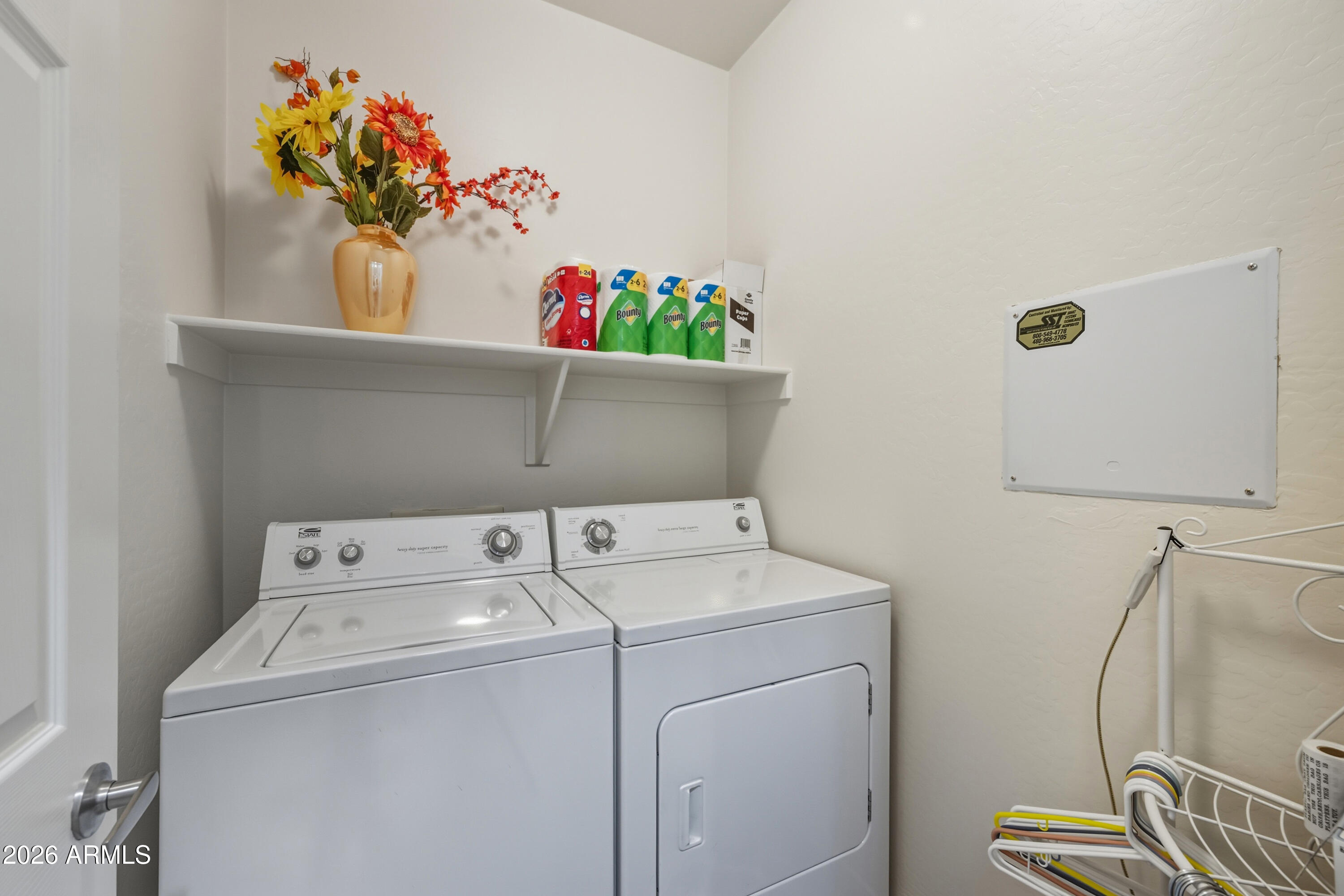 2101 South Meridian Road, Unit 198 Apache Junction, AZ 85120 - Photo 23 of 29 a utility room with dryer and washer