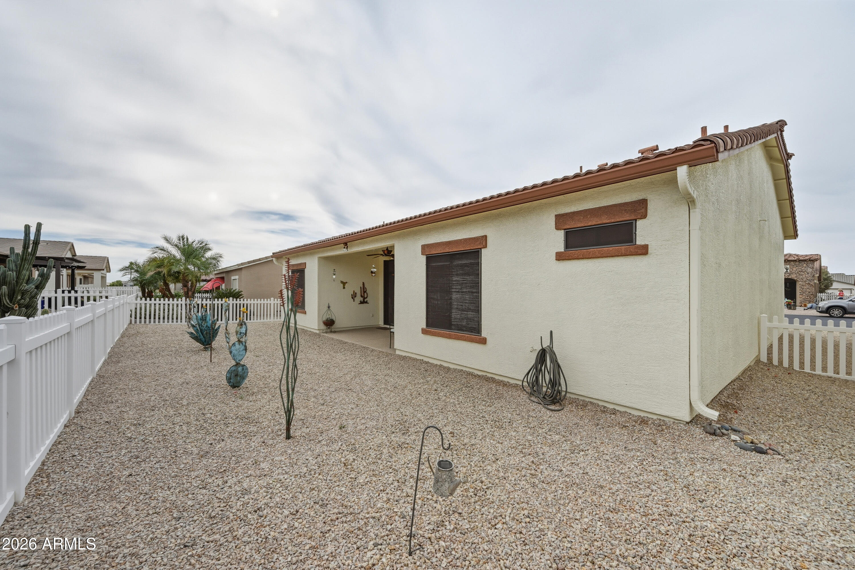 2101 South Meridian Road, Unit 198 Apache Junction, AZ 85120 - Photo 25 of 29 a view of a house with backyard