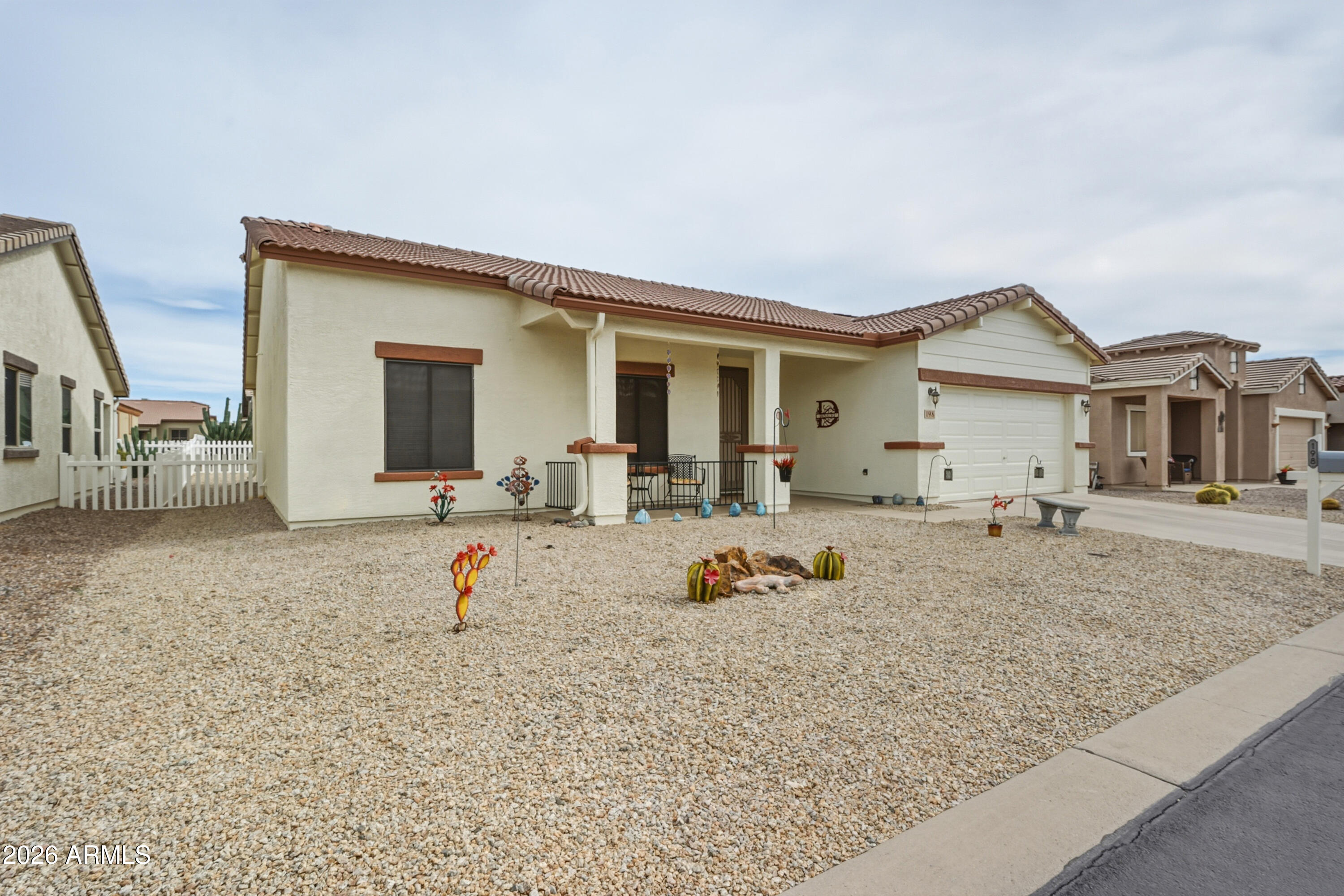 2101 South Meridian Road, Unit 198 Apache Junction, AZ 85120 - Photo 3 of 29 a view of a house with a patio