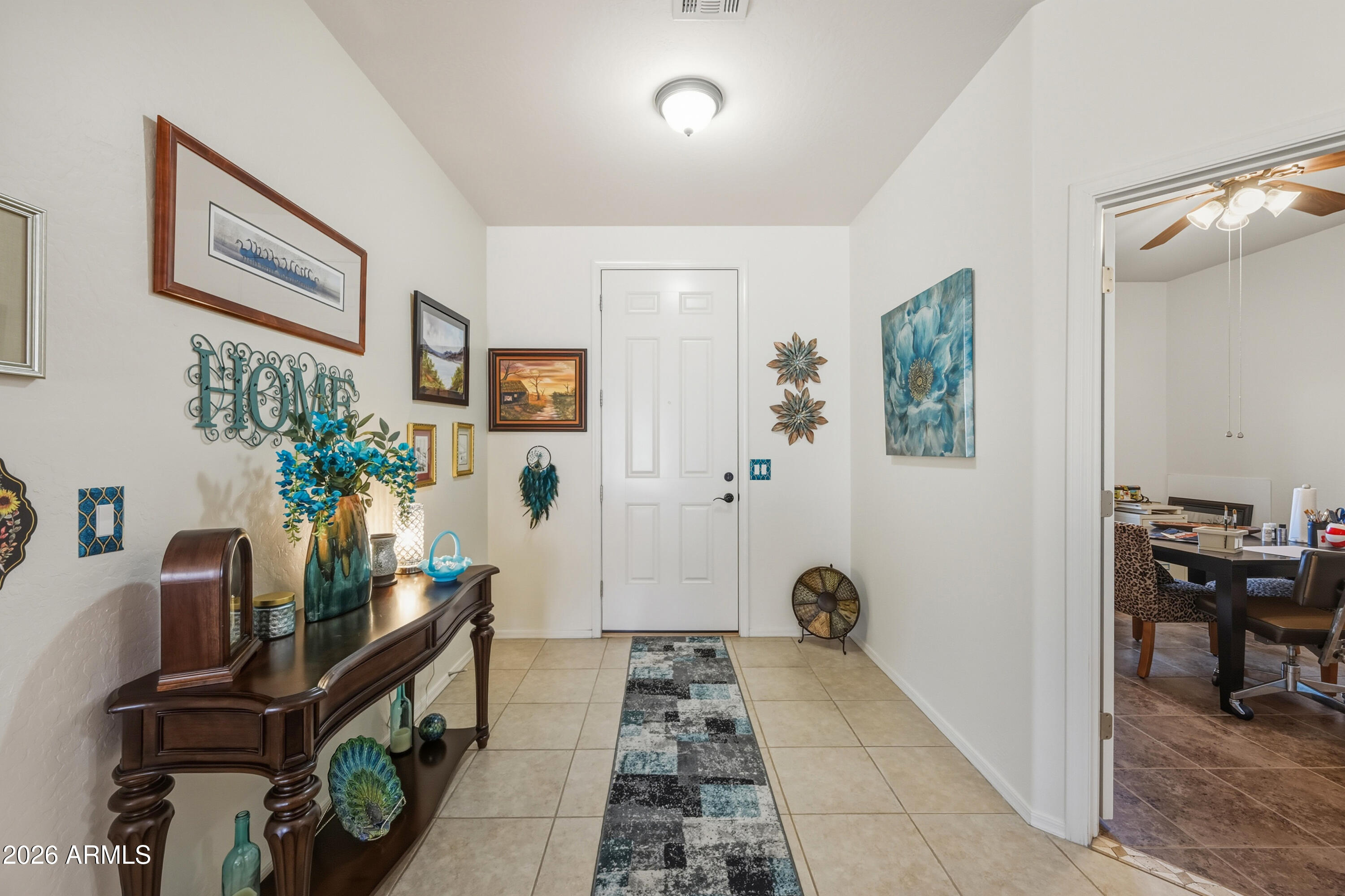 2101 South Meridian Road, Unit 198 Apache Junction, AZ 85120 - Photo 4 of 29 a view of a hallway with workspace and a window