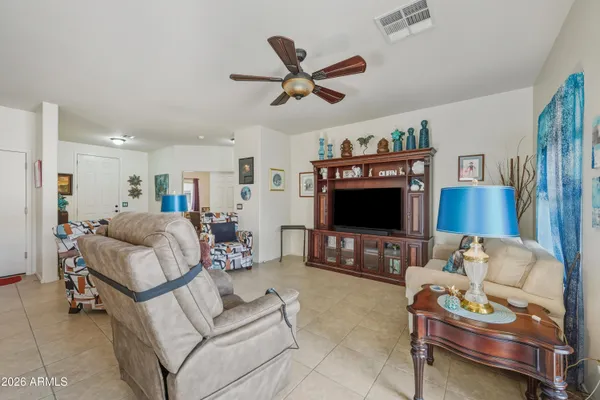 a kitchen with a dining table and chairs
