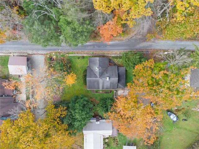 view of a house with a yard