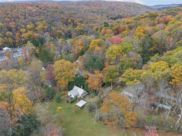 an aerial view of residential house with parking space