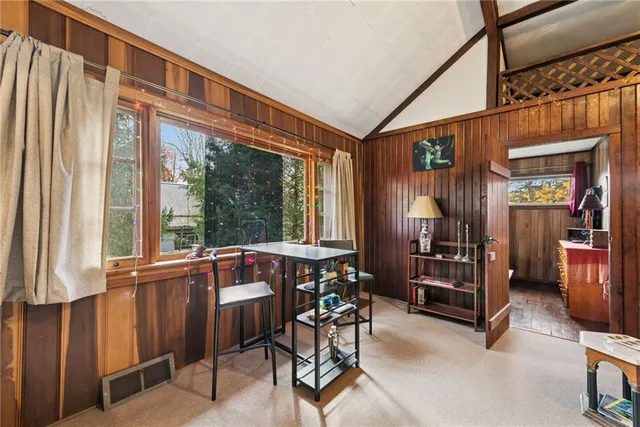 a view of a livingroom with furniture and window