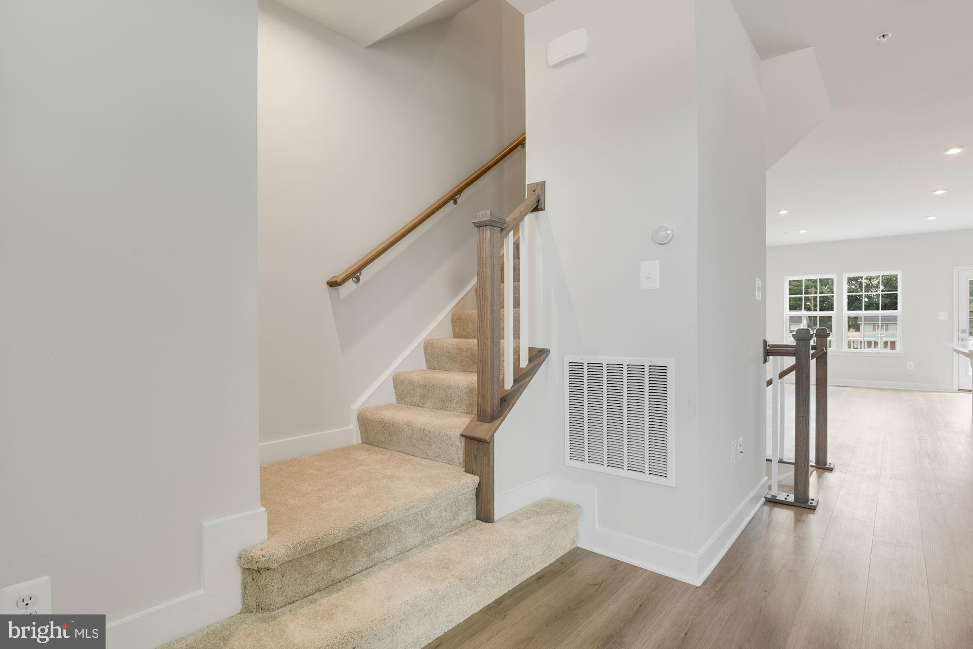 221 Edwin Road Frederick, MD 21702 - Photo 12 of 36 a view of entryway and hall with wooden floor