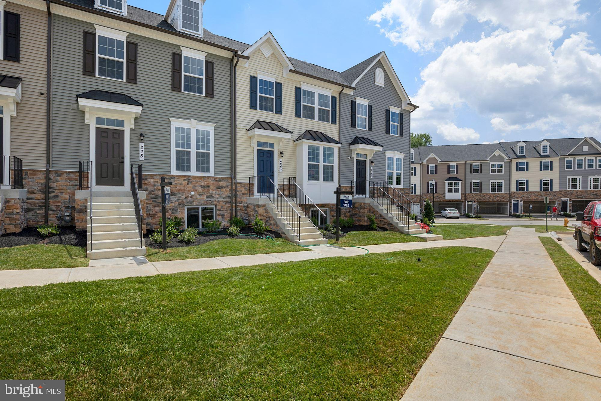 221 Edwin Road Frederick, MD 21702 - Photo 2 of 36 a front view of a house with a yard and garden