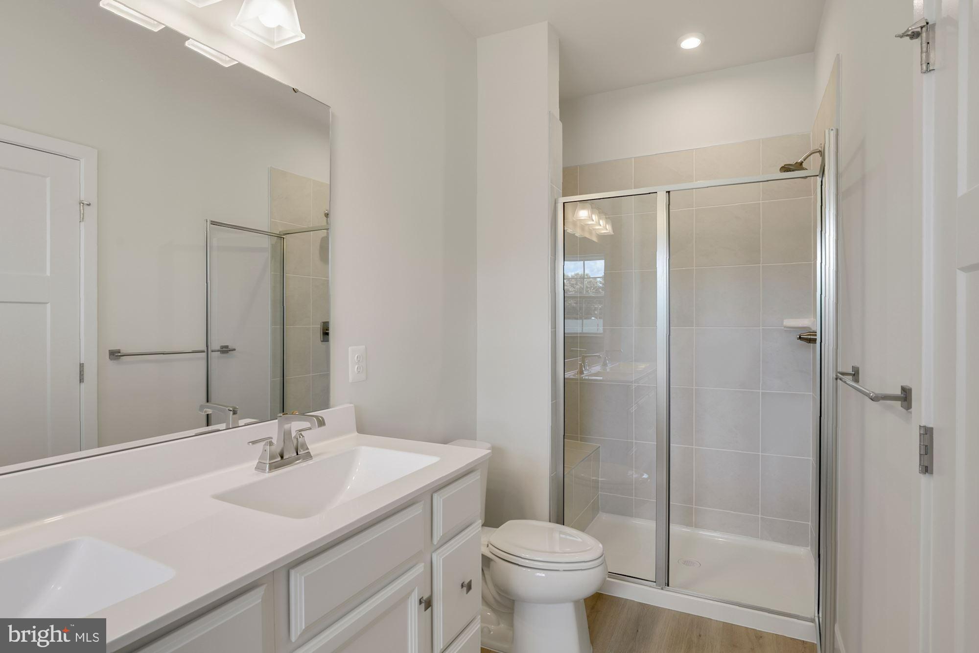 221 Edwin Road Frederick, MD 21702 - Photo 27 of 36 a bathroom with a sink toilet and shower
