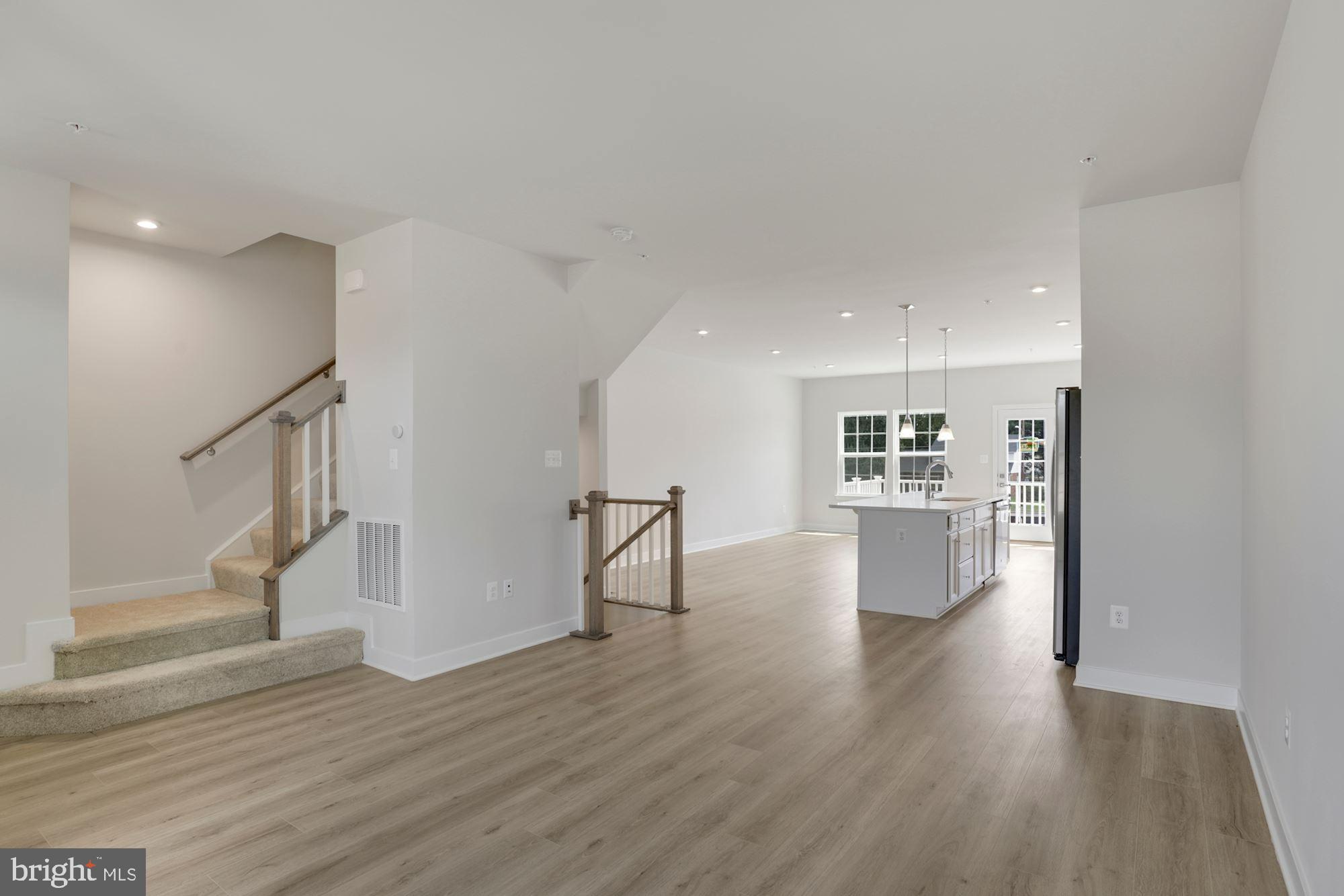 221 Edwin Road Frederick, MD 21702 - Photo 5 of 36 a view of empty room with wooden floor
