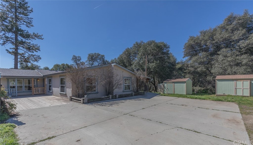 4716 Leonard Road Mariposa, CA 95338 - Photo 1 of 1 front view of a house with a dry yard