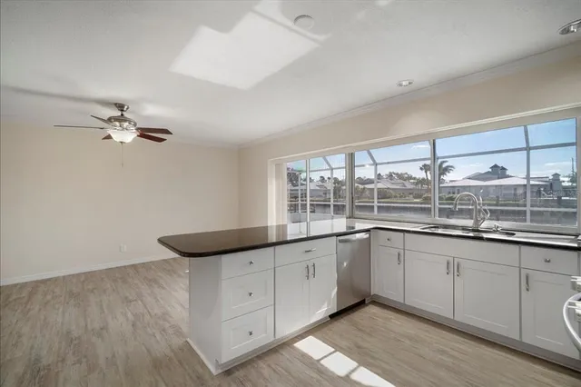a kitchen with a refrigerator and countertop
