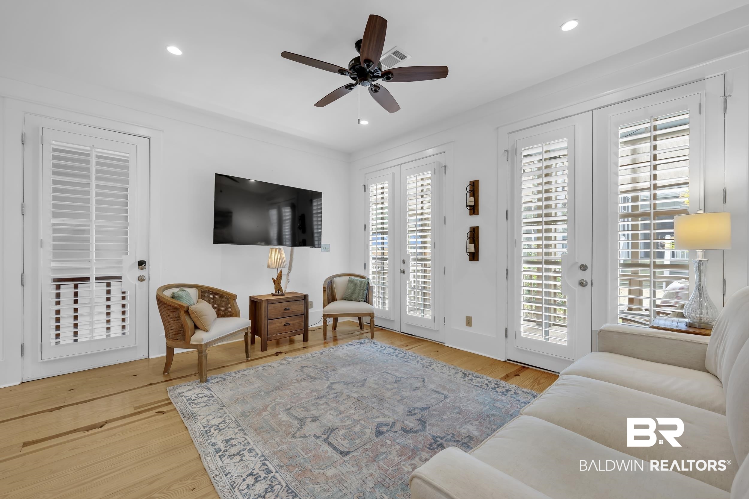 25773 Canal Road, Unit 32 Orange Beach, AL 36561 - Photo 10 of 35 Living room with light wood-style flooring, a ceiling fan, and recessed lighting