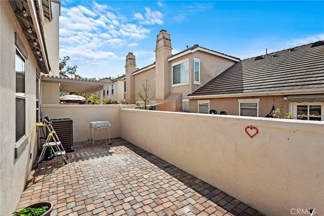 a house view with a outdoor space
