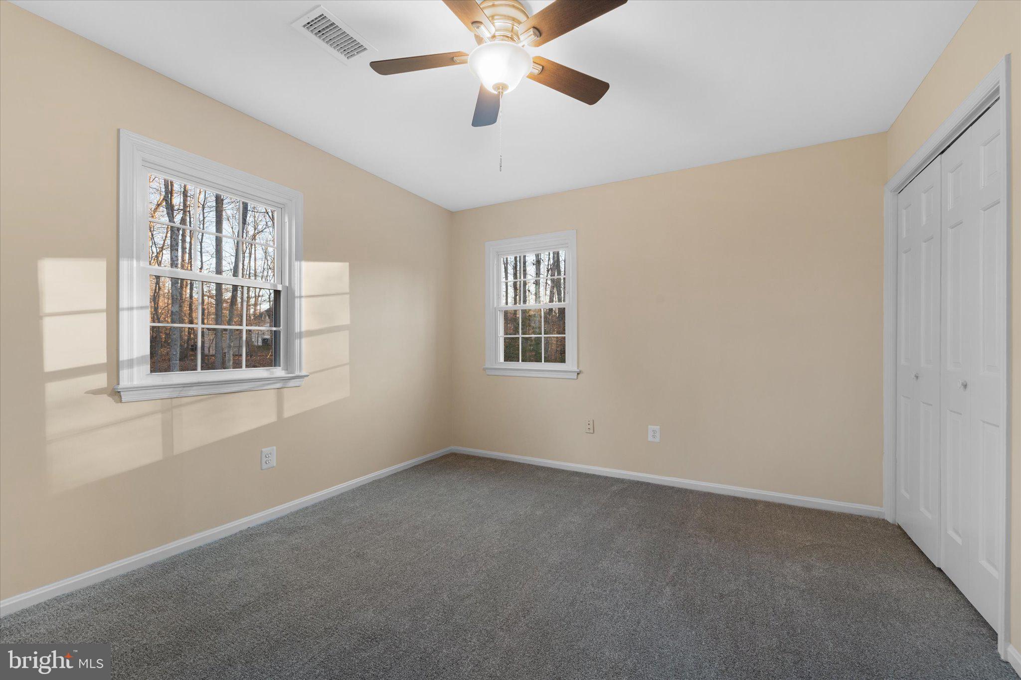 8016 Stillbrooke Road Manassas, VA 20112 - Photo 30 of 41 a view of an empty room with a window