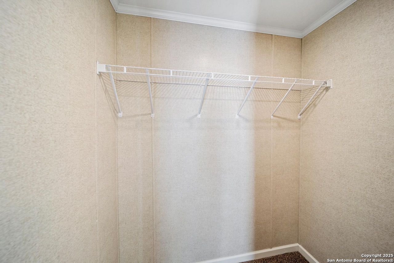 1700 Sandbranch Road Bigfoot, TX 78005 - Photo 13 of 14 a bathroom with a shower