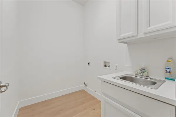 a bathroom with a sink and vanity