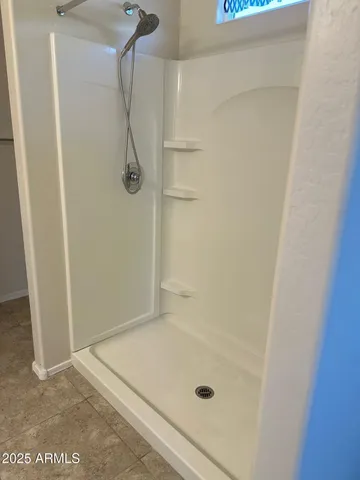 a bathroom with a bath tub