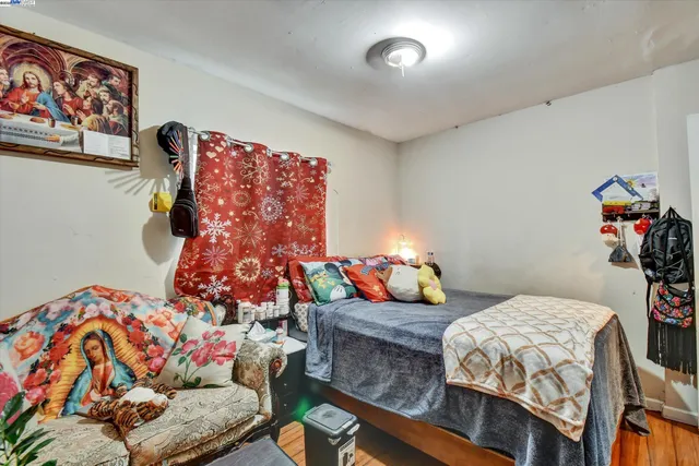 a bedroom with furniture and a bed