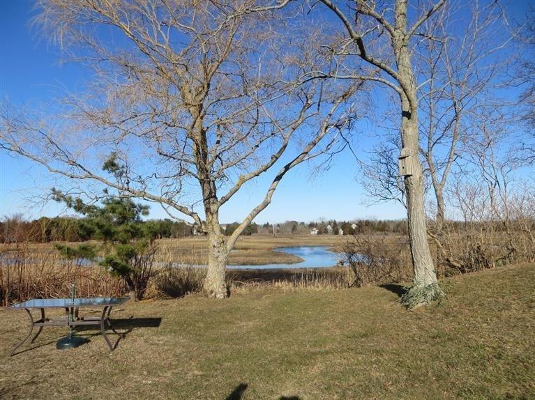 137 Rock Harbor Road, Unit 5 Orleans, MA 02653 - Photo 6 of 13 a view of swimming pool with a yard