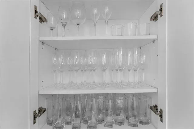 a kitchen with stainless steel appliances granite countertop a stove and a microwave