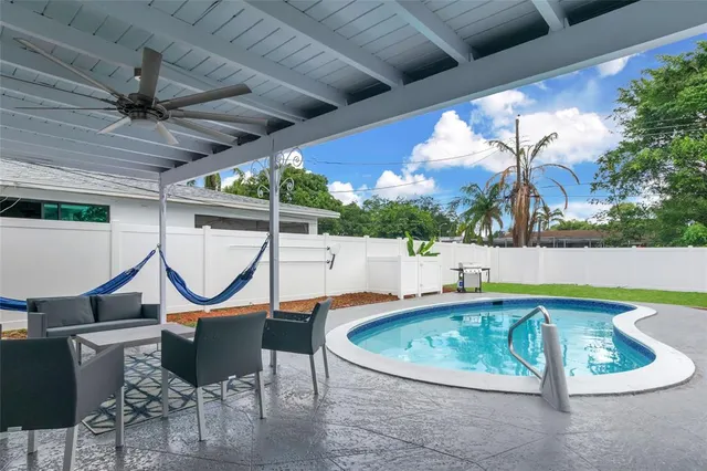 a work room with furniture and stairs