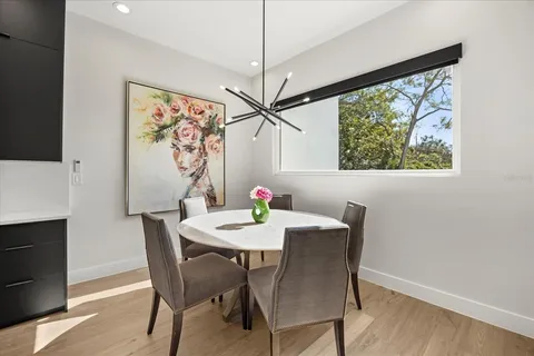 a room with linen closet and wooden floor
