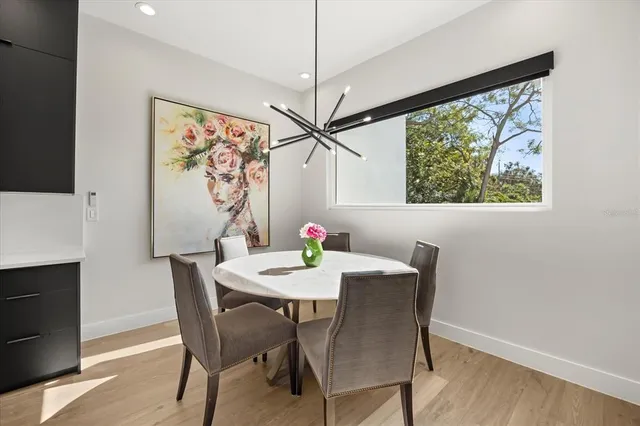 a room with linen closet and wooden floor