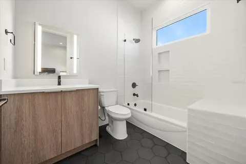 a view of a kitchen with furniture and a kitchen